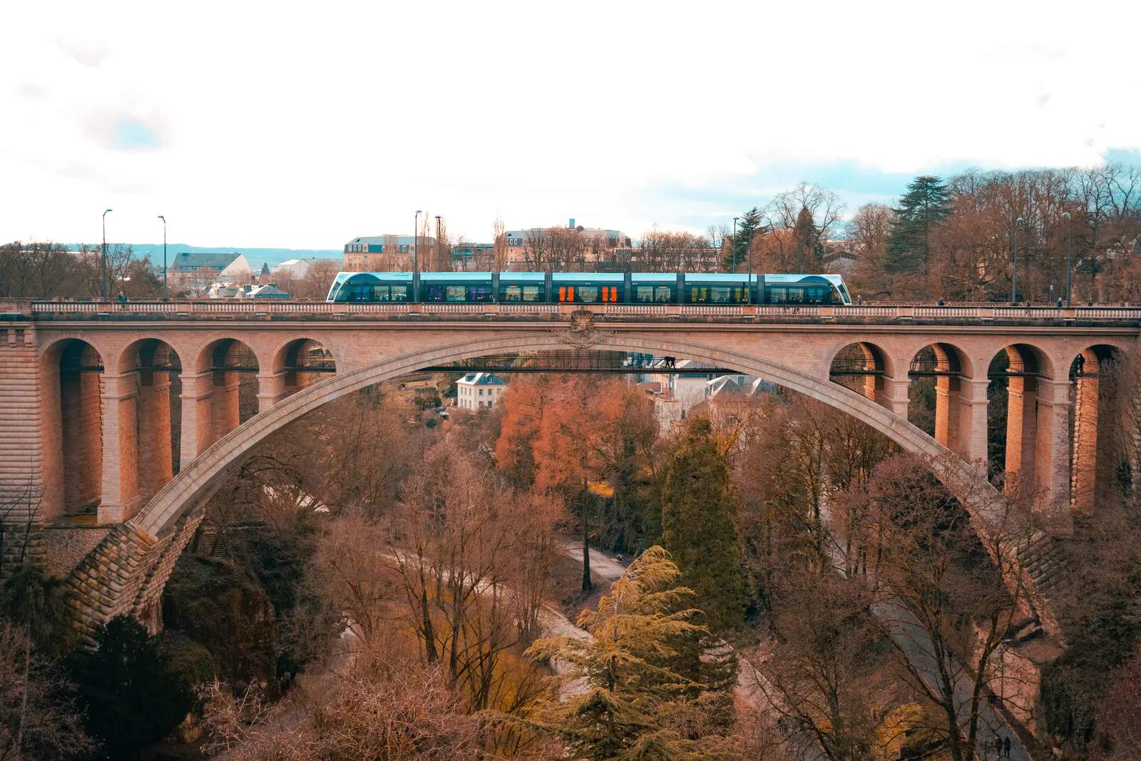 Train crossing a viaduct in Luxembourg City