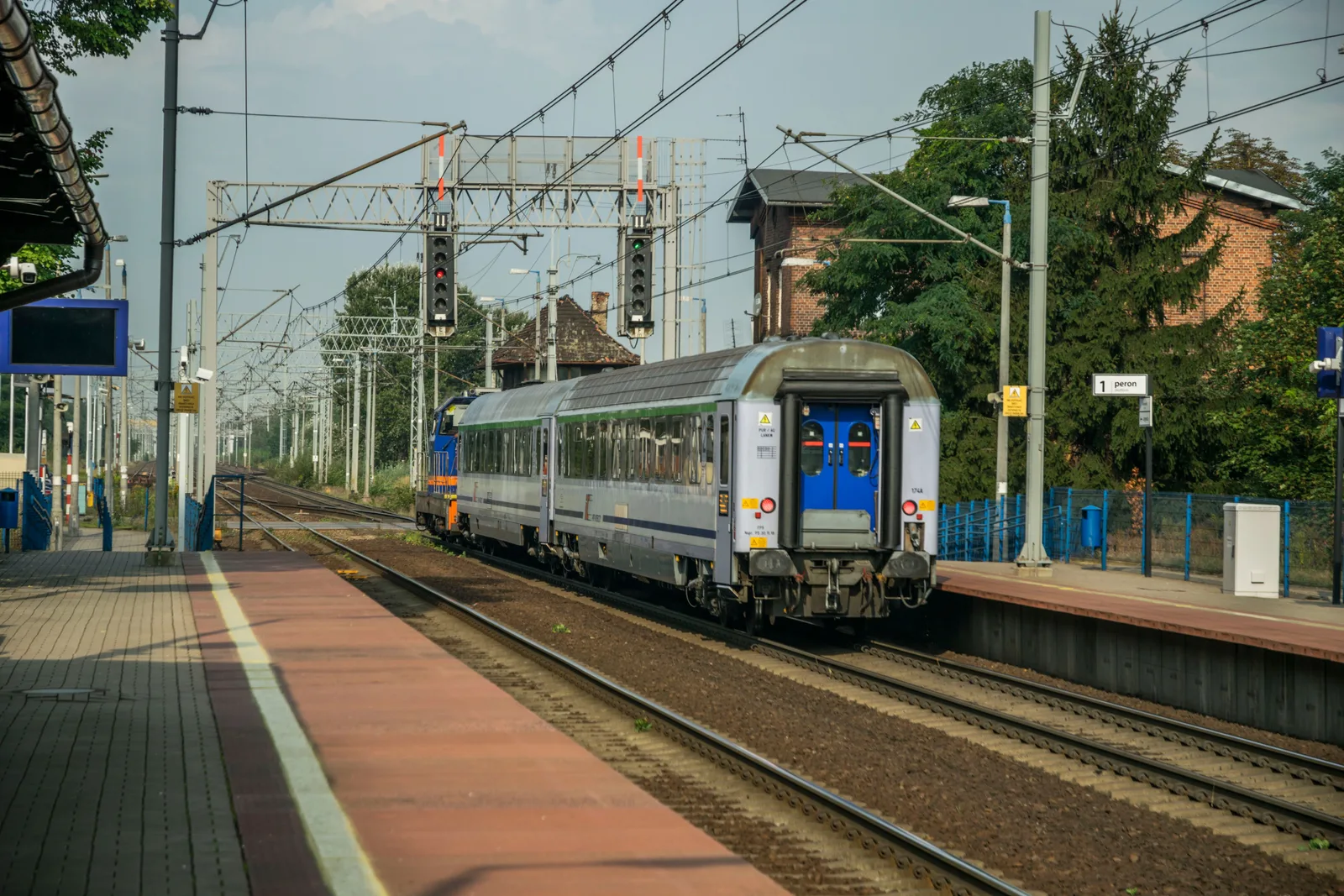Train at a station platform in Poland