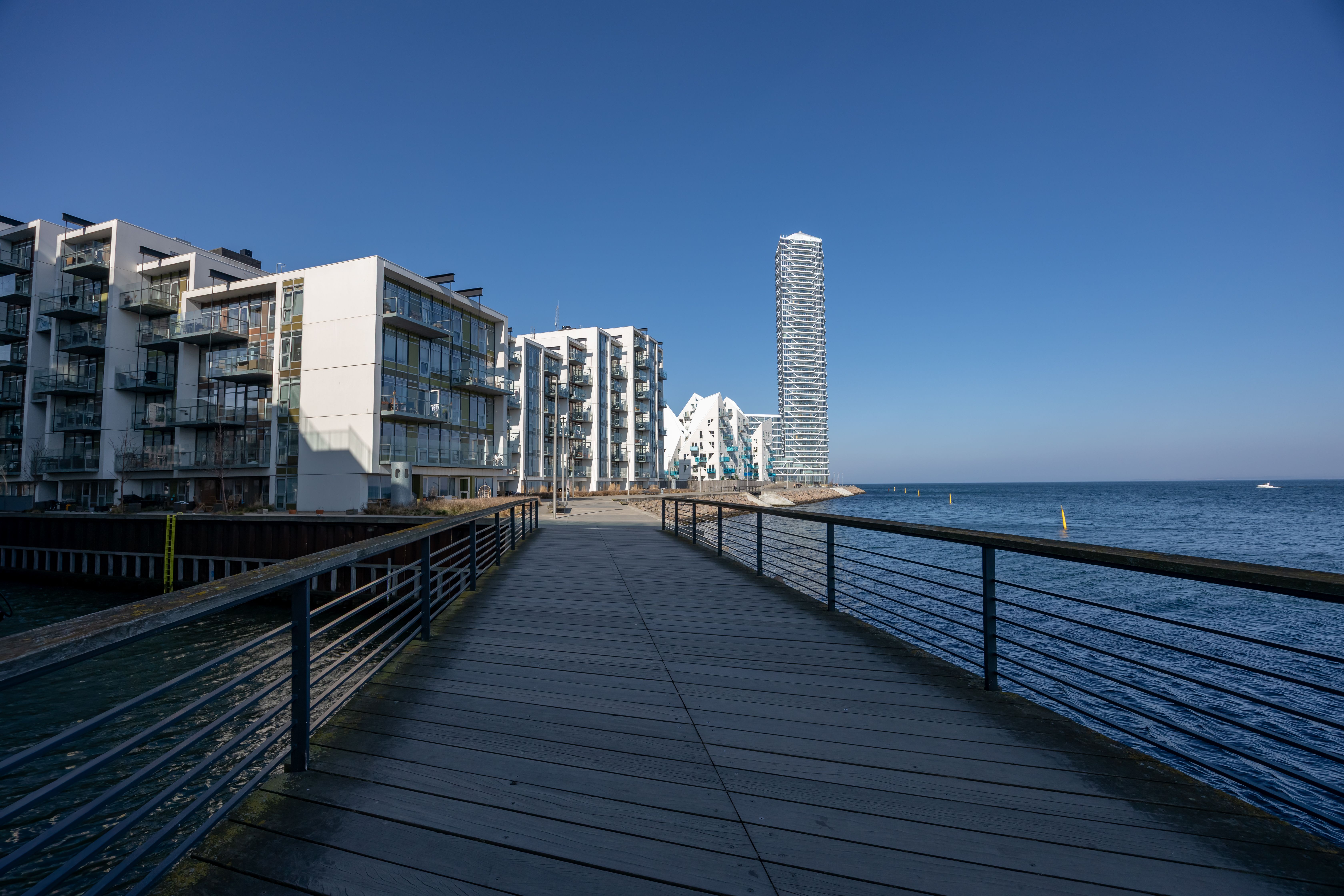 Modern waterfront apartments and a boardwalk on the Aarhus harbour front