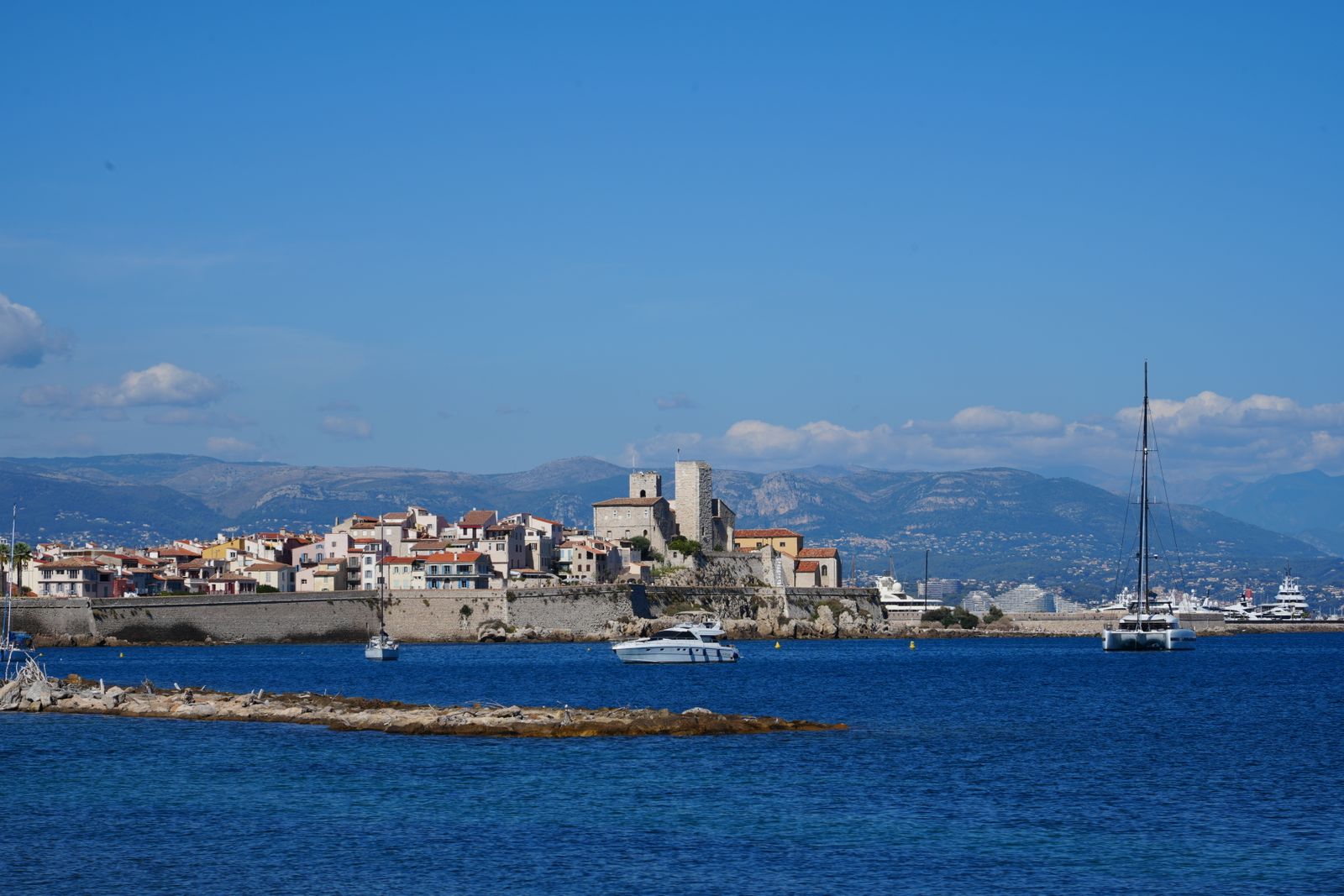 Antibes old town and historic fortifications above the Mediterranean marina.