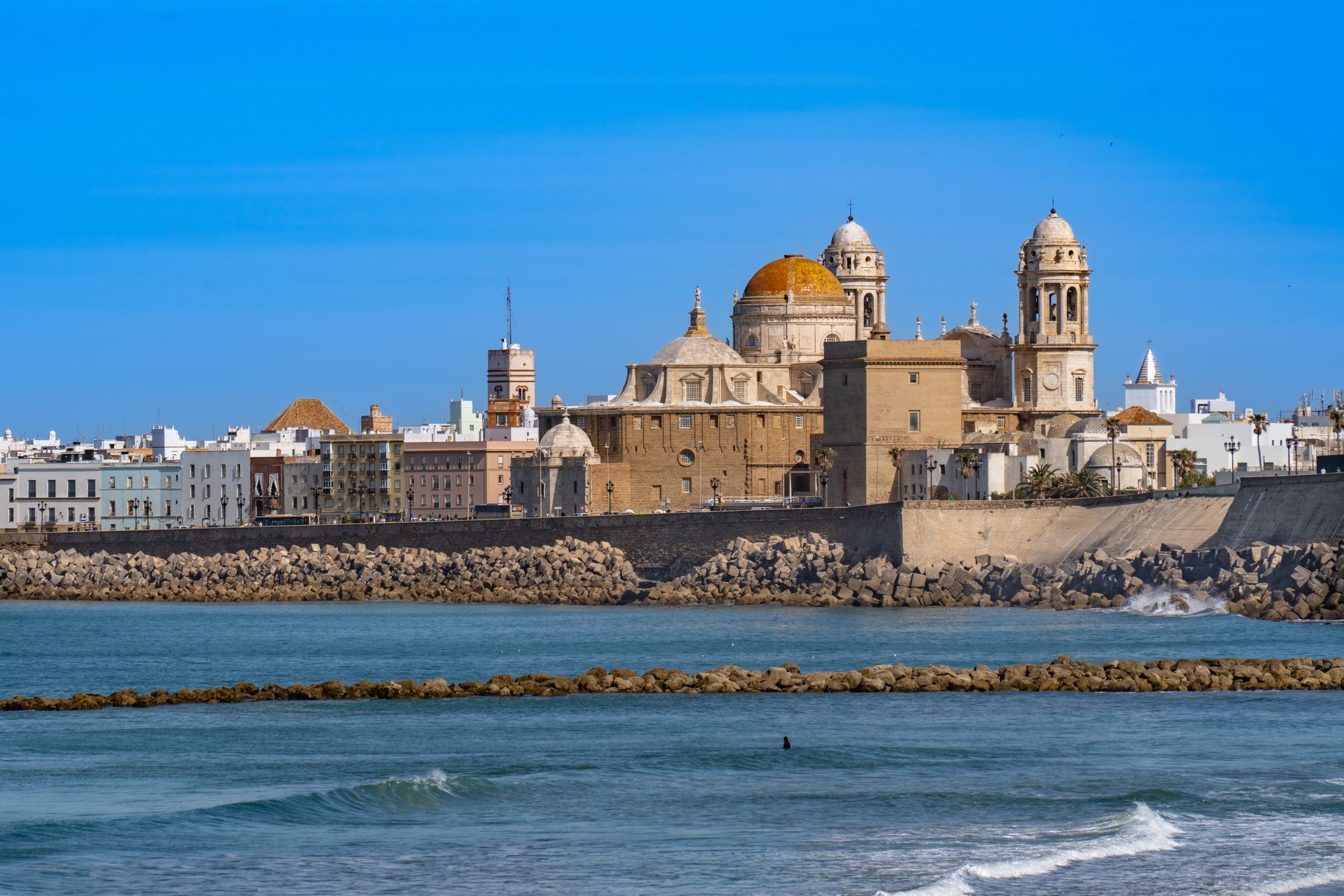 Cádiz Cathedral and the seafront seen across the water