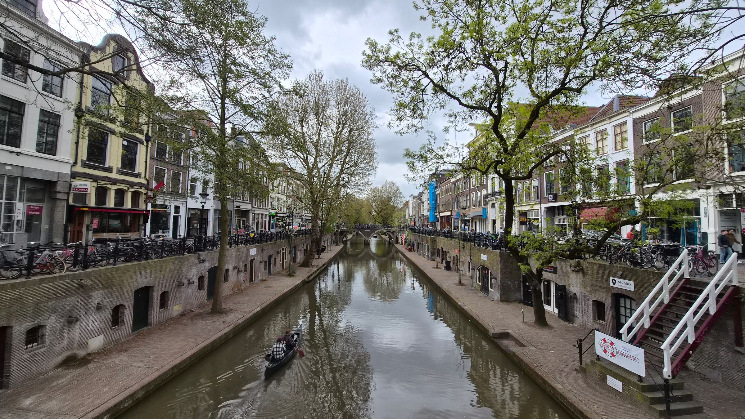 The Oudegracht canal in Utrecht with its lower wharves and trees along the banks