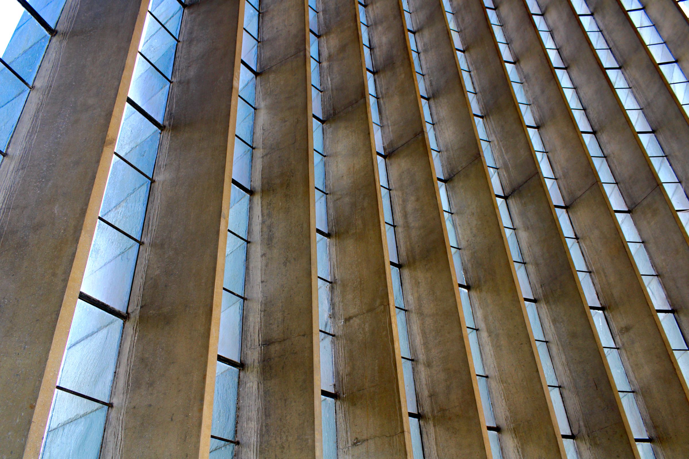 The tall angled windows of Coventry Cathedral