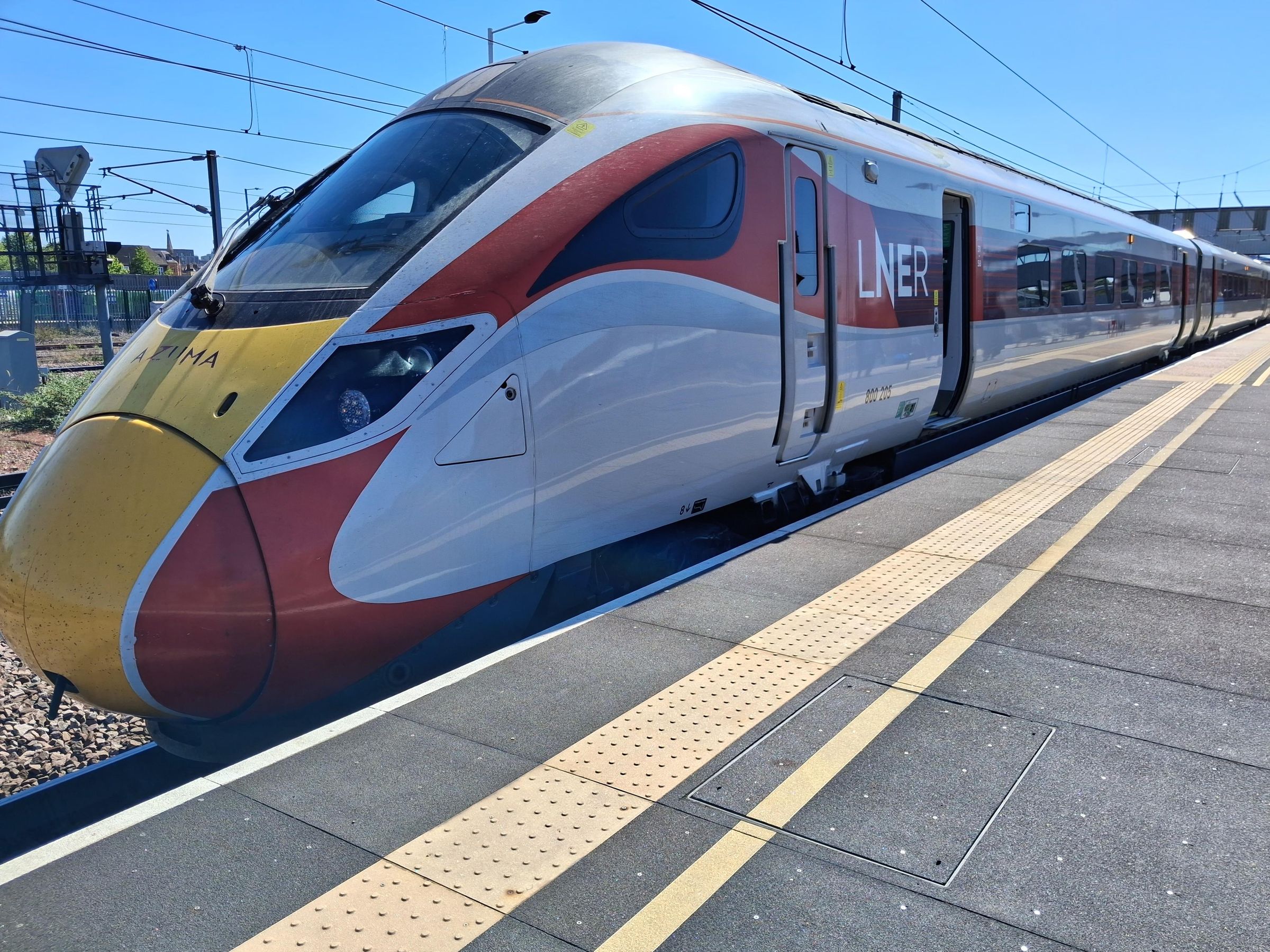 An LNER Azuma train at a station platform