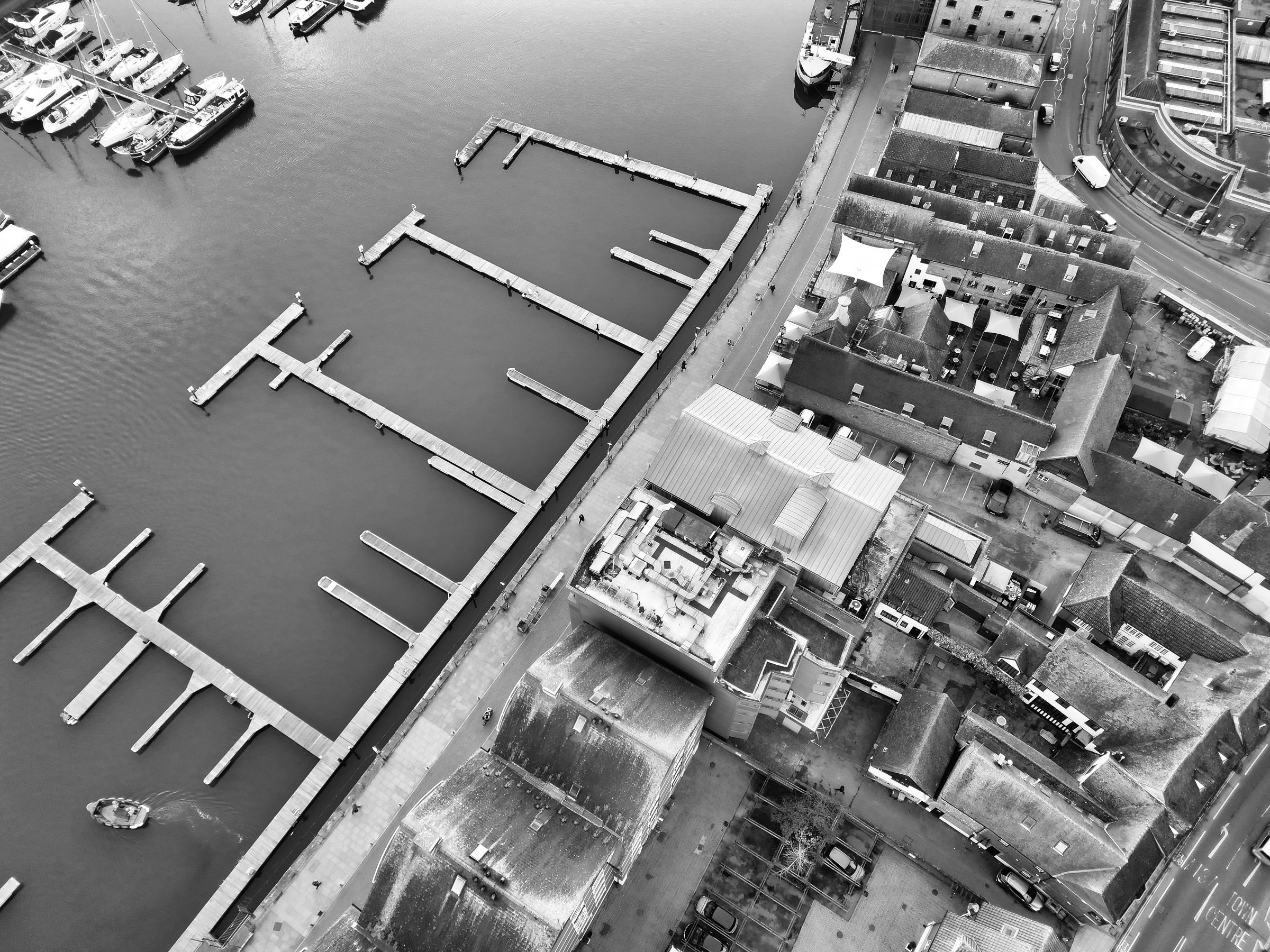 Ipswich marina and waterfront seen from the air, in black and white